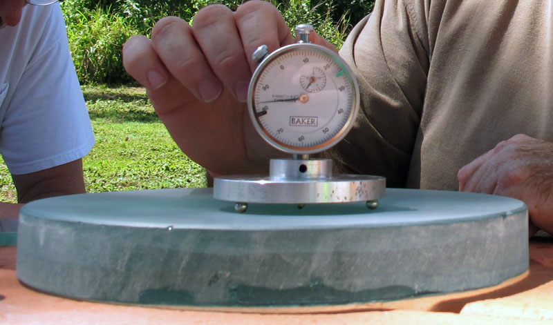 Spherometer testing a mirror's depth